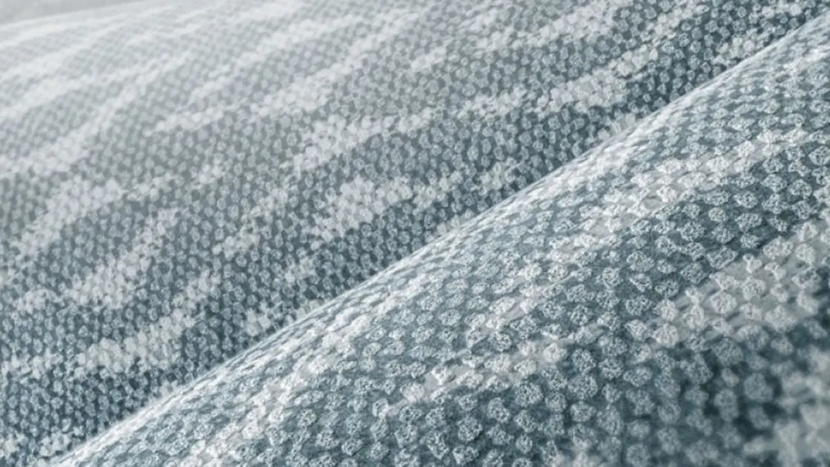 Leather accents can add a soft aura, given the right colours and textures are chosen